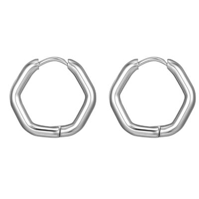 Los pendientes hexagonales, los pendientes de oro, los pendientes hexagonales para fiestas.