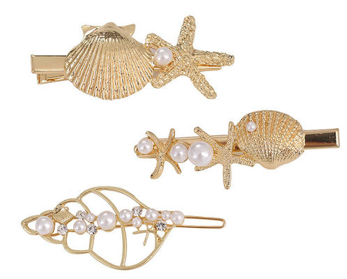Usar diariamente accesorios para el cabello de metal dorado con perla