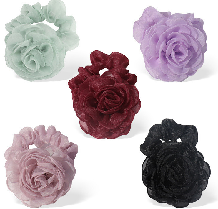 Scrunchies de pelo de flores con varios colores para cualquier atuendo
